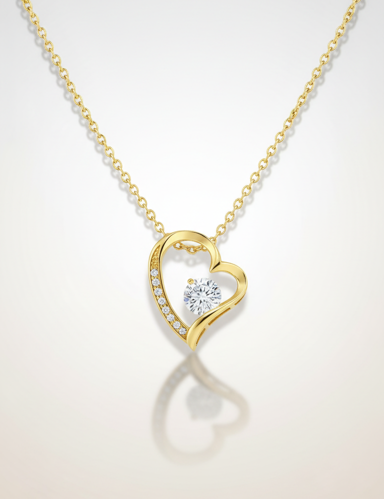 Elegante gouden dames ketting met hartvormige hanger en fonkelende steen van Labellaa